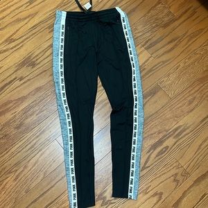 Pink Victoria’s Secret skinny track pants